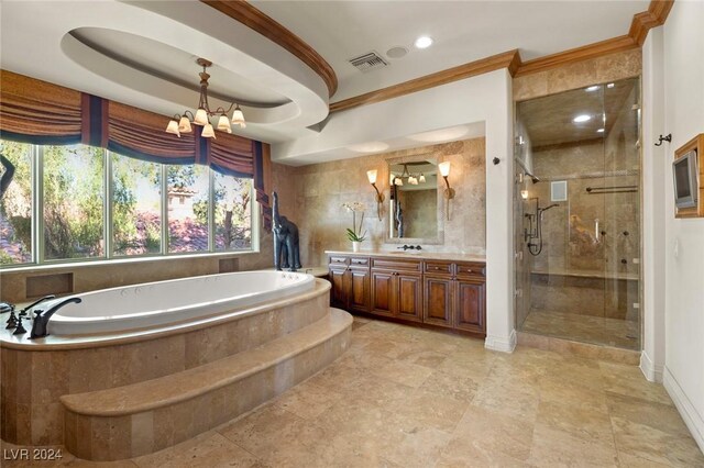 bathroom featuring an inviting chandelier, vanity, tile patterned flooring, crown molding, and plus walk in shower