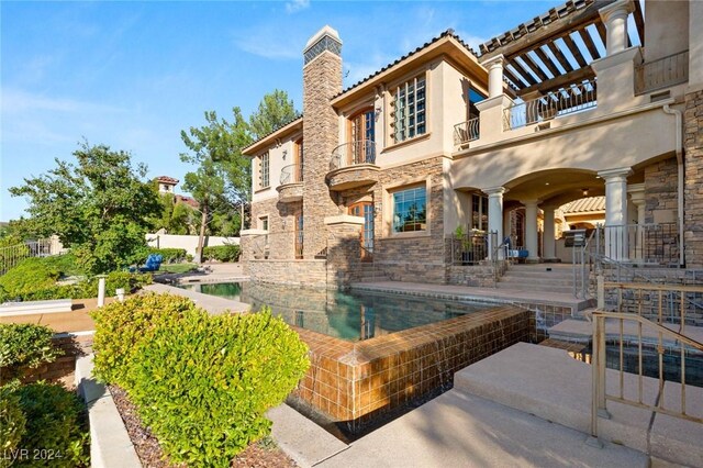 view of swimming pool with a patio area