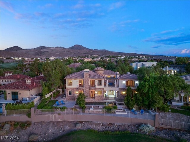 aerial view at dusk with a mountain view