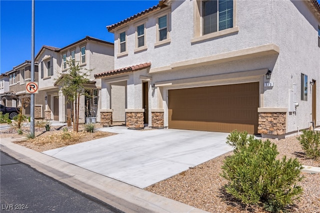 view of front of property with a garage