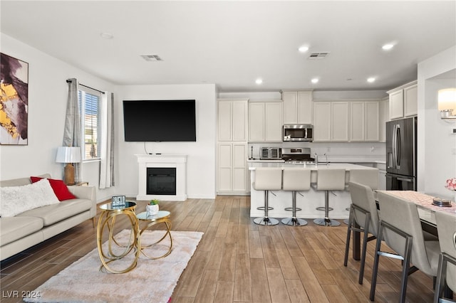 living room featuring light hardwood / wood-style floors