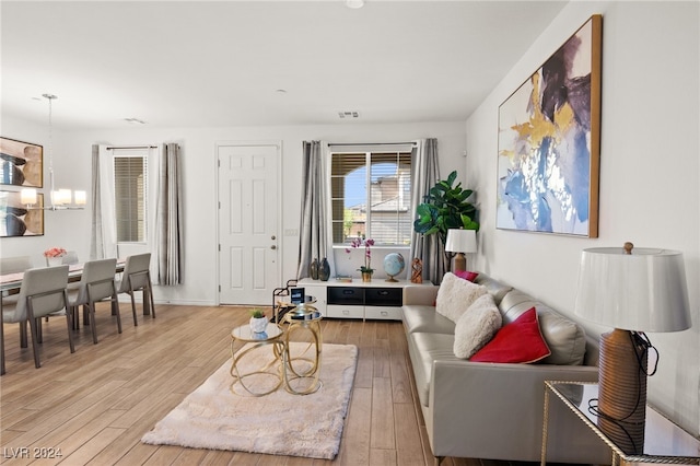 living room with light hardwood / wood-style flooring