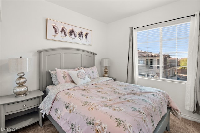 bedroom featuring carpet