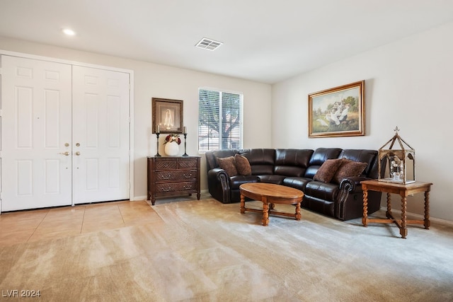 living room featuring light carpet