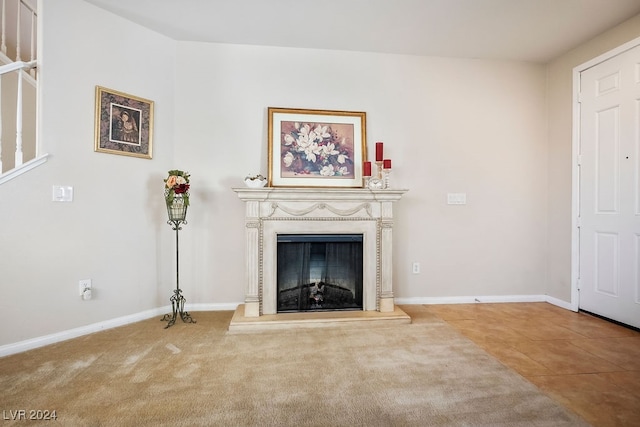 unfurnished living room with tile patterned flooring