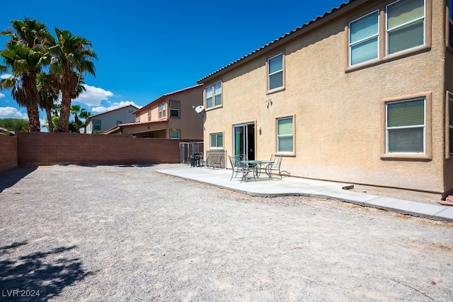 rear view of property with a patio area