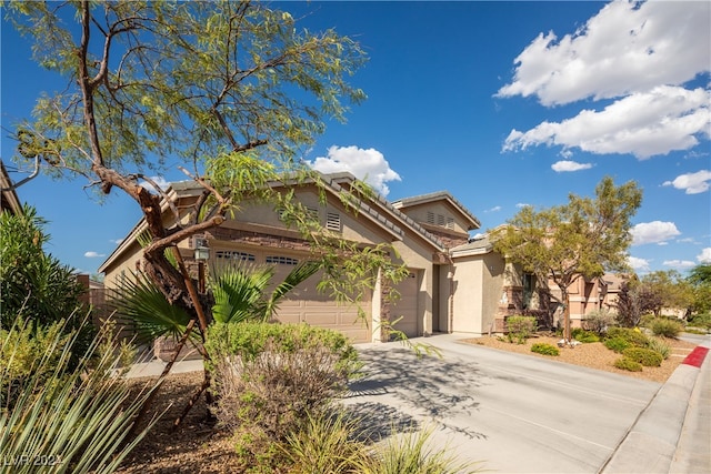 view of front of property featuring a garage