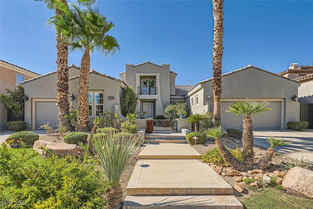 mediterranean / spanish-style home featuring a garage