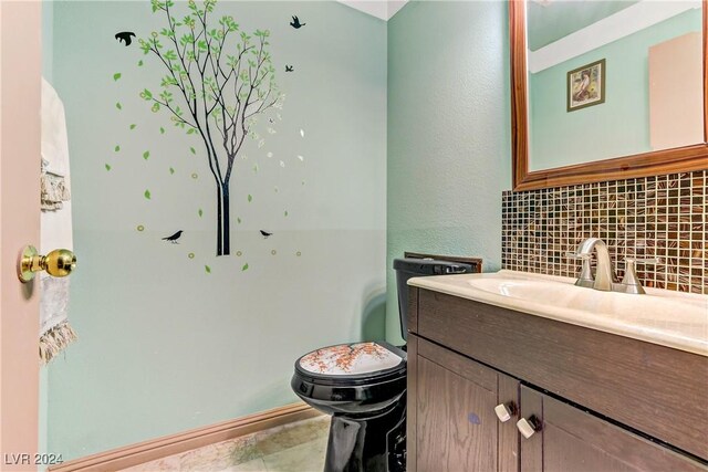 half bath featuring toilet, backsplash, and vanity