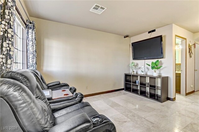 living room with light tile patterned floors