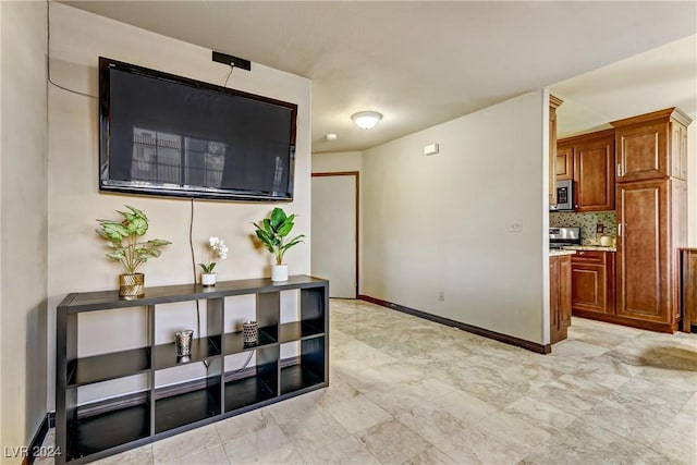 interior space featuring baseboards