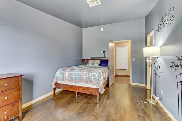 bedroom featuring wood-type flooring