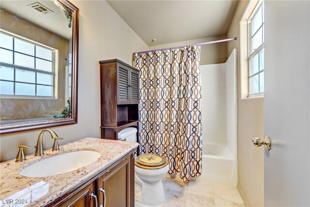 full bathroom featuring a wealth of natural light, toilet, shower / tub combo with curtain, and vanity