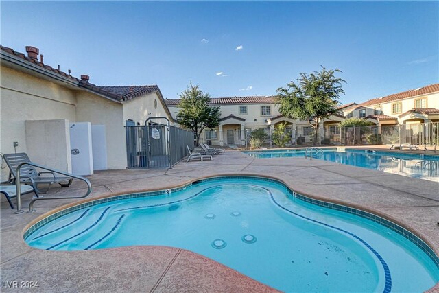 view of pool featuring a patio area