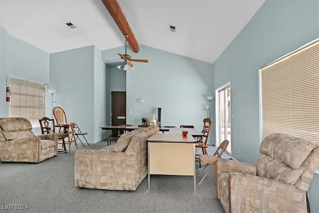 living room with carpet floors, beam ceiling, and high vaulted ceiling