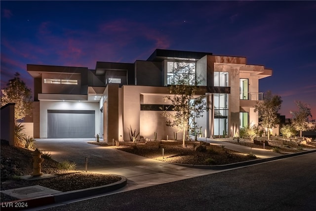 contemporary house featuring a garage