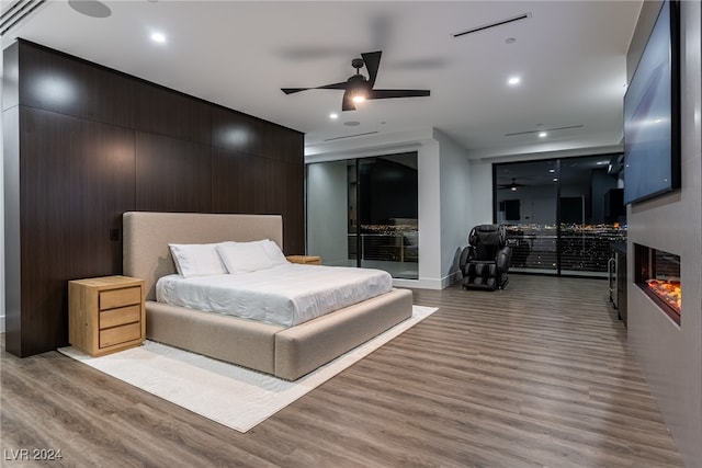 bedroom featuring ceiling fan and light wood-type flooring