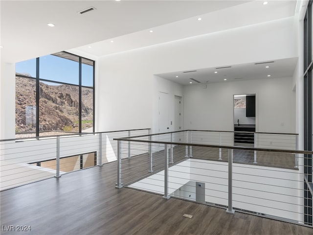 interior space with hardwood / wood-style flooring