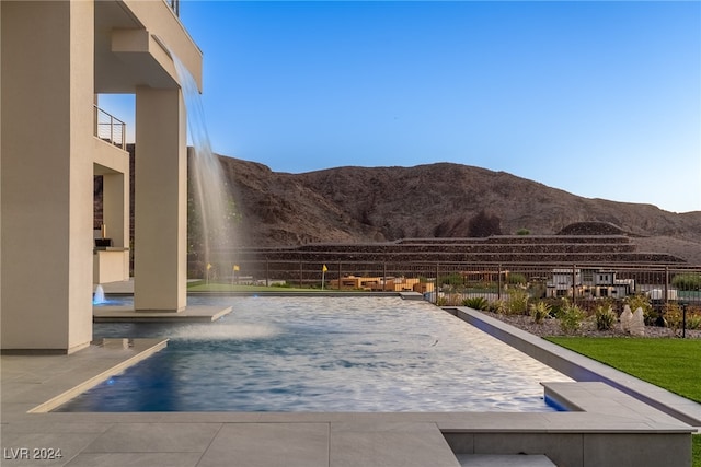 view of pool featuring a mountain view