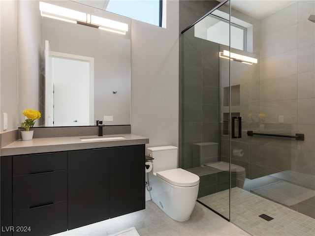 bathroom featuring a shower with door, toilet, tile patterned floors, and vanity