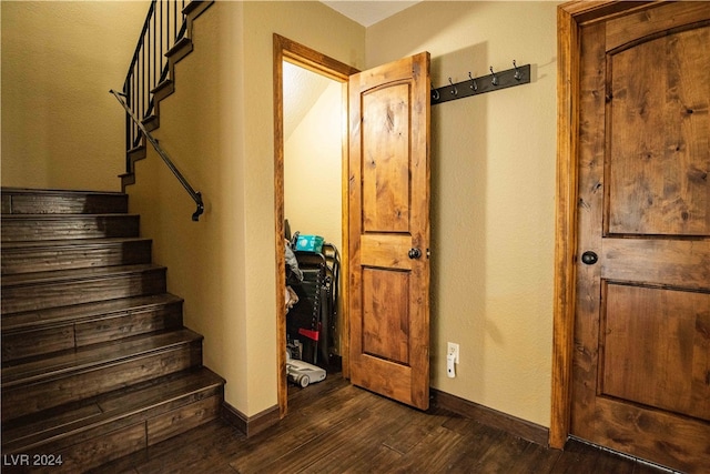 staircase featuring hardwood / wood-style flooring