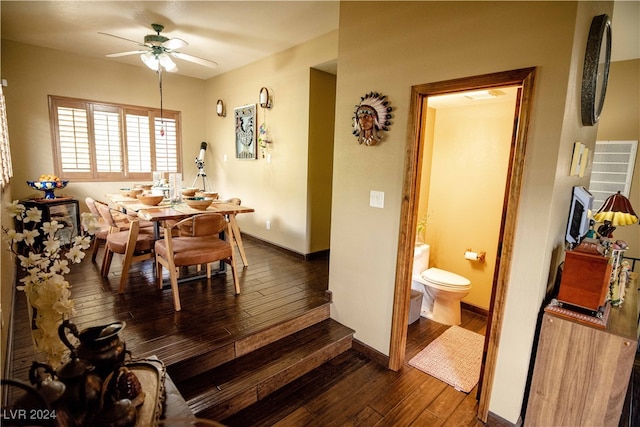 dining room featuring ceiling fan and wood-type flooring