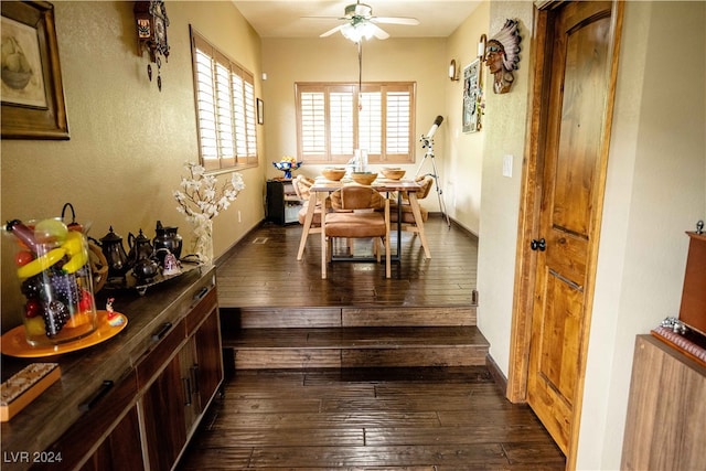 dining area with dark hardwood / wood-style flooring and ceiling fan