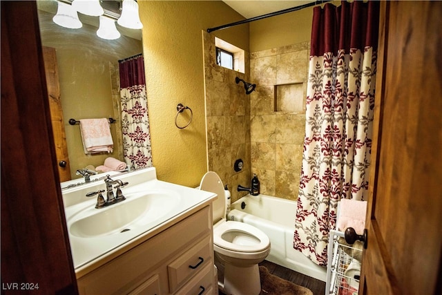 full bathroom featuring shower / bath combination with curtain, toilet, and vanity