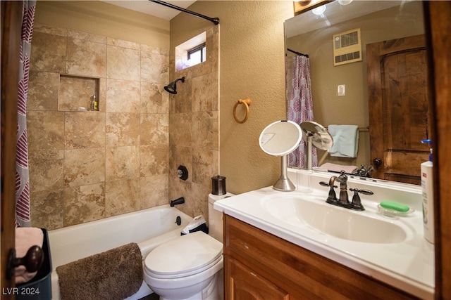 full bathroom with shower / bath combination with curtain, toilet, and vanity