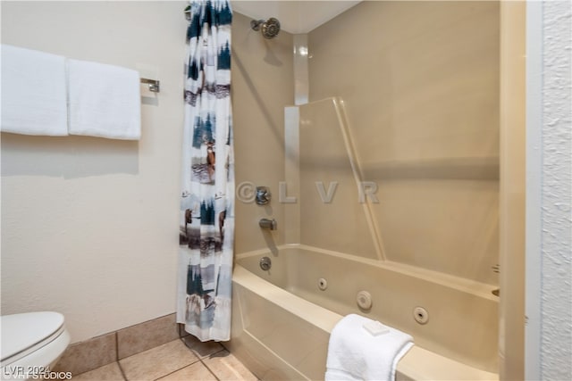 bathroom featuring shower / bath combo, toilet, and tile patterned flooring