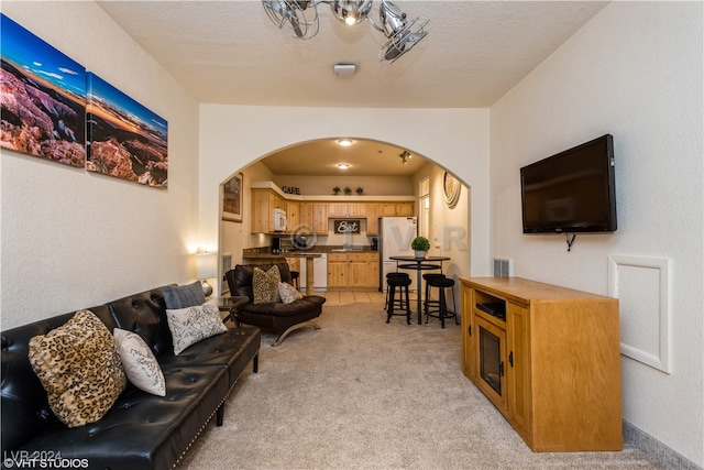 tiled living room with a textured ceiling