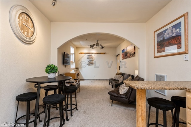 view of carpeted dining room