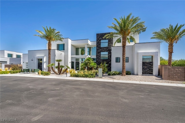 9760 Solar Ave, Las Vegas, NV 89149 - contemporary house with stucco siding and stone siding