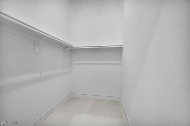 9760 Solar Ave, Las Vegas, NV 89149 - walk in closet with light tile patterned floors