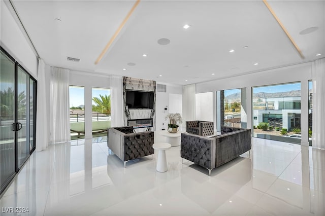 9760 Solar Ave, Las Vegas, NV 89149 - living area with light tile patterned flooring and recessed lighting
