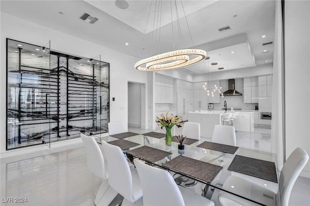 dining room featuring a chandelier, visible vents, and recessed lighting