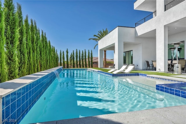 pool featuring a patio area