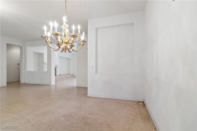 1629 Black Fox Canyon Rd, Henderson, NV 89052 - spare room with a chandelier and light tile patterned floors