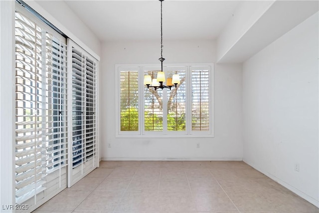 1629 Black Fox Canyon Rd, Henderson, NV 89052 - unfurnished dining area with a chandelier, tile patterned floors, and baseboards