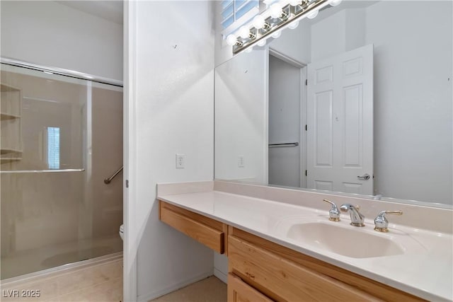 1629 Black Fox Canyon Rd, Henderson, NV 89052 - bathroom featuring a shower stall, vanity, toilet, and tile patterned floors