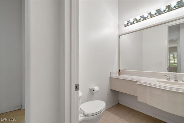 1629 Black Fox Canyon Rd, Henderson, NV 89052 - bathroom featuring toilet, tile patterned floors, vanity, and baseboards