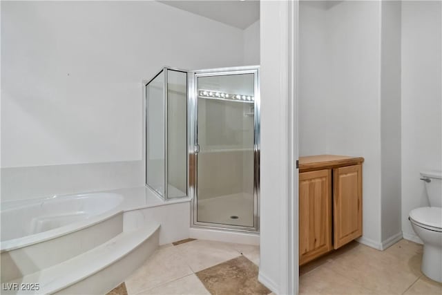 1629 Black Fox Canyon Rd, Henderson, NV 89052 - full bathroom featuring tile patterned flooring, a stall shower, a bath, and toilet