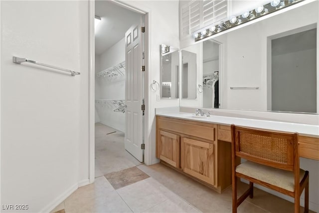 1629 Black Fox Canyon Rd, Henderson, NV 89052 - bathroom featuring vanity and a walk in closet