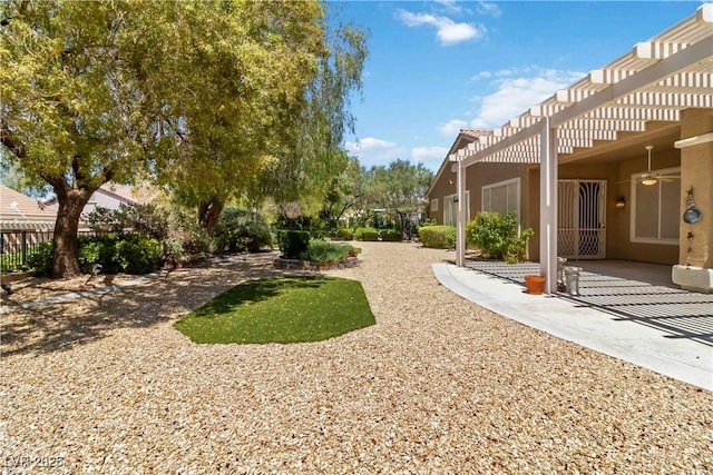 1629 Black Fox Canyon Rd, Henderson, NV 89052 - view of yard featuring a patio, ceiling fan, and a pergola