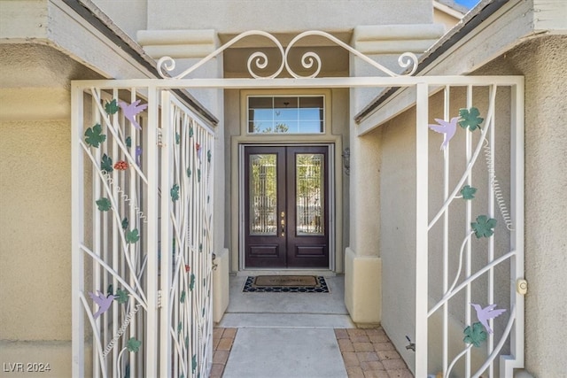 property entrance featuring french doors