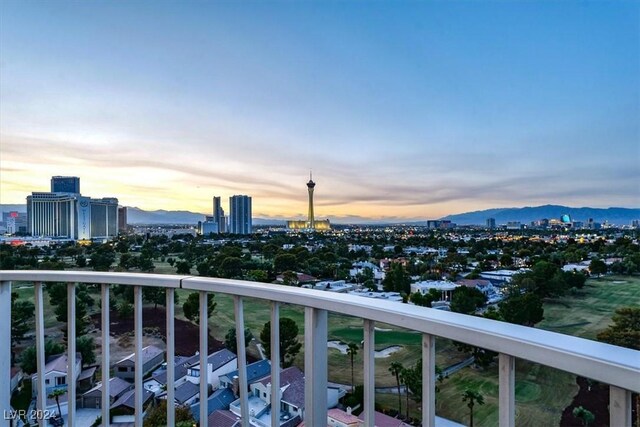 view of balcony at dusk