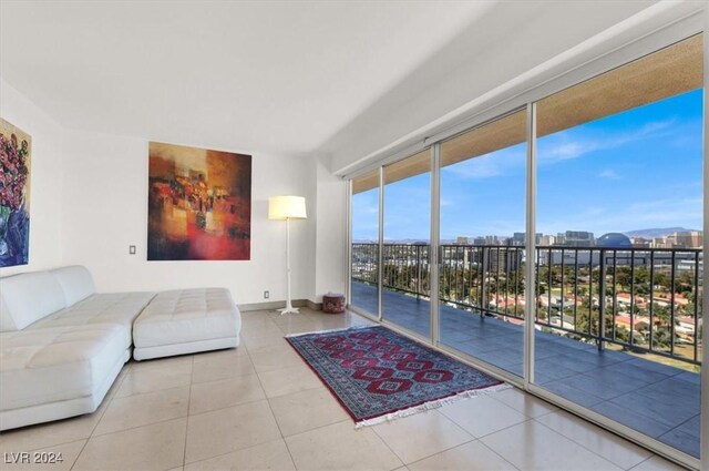 living room with light tile patterned floors