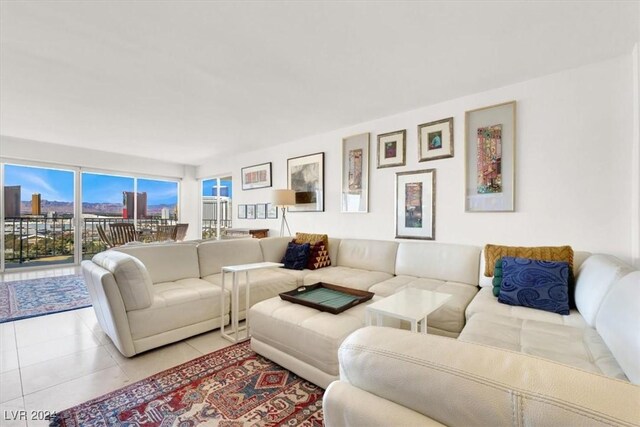 living room with light tile patterned floors