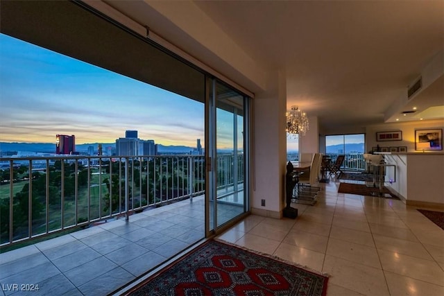 balcony with visible vents and a city view