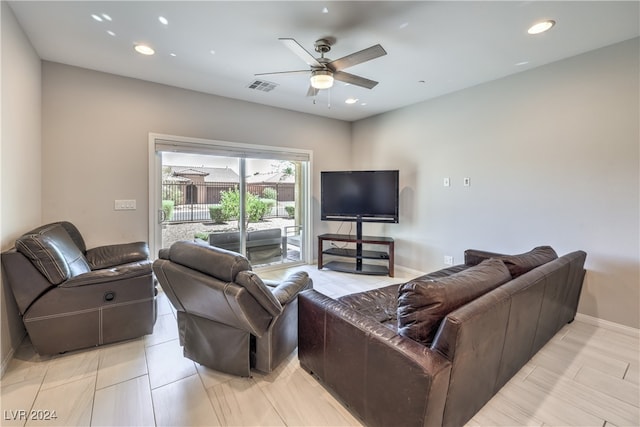 living room with ceiling fan